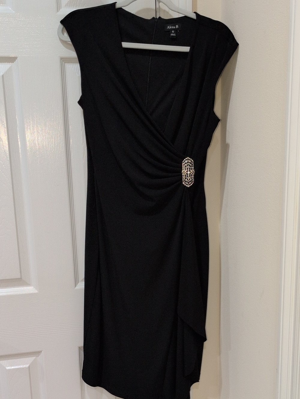 Alexis Black Sleeveless Midi Dress with Decorative Brooch